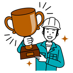 銅のトロフィーを掲げる作業員の男性