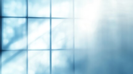 Abstract interior with soft blue light streaming through large windows, creating a serene atmosphere