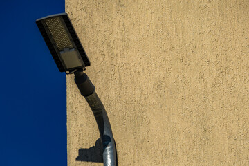 LED mounted on the facade of a building against the background of a blue sky, warning lighting