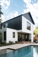 Fototapeta premium Modern two-story house with sleek design near swimming pool under a bright sky, showcasing elegant architecture and outdoor relaxation space in a residential area