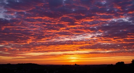 Fototapeta premium Fiery sunset paints vibrant cloudscape. AI Generated