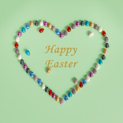 Happy Easter Card with Colorful Eggs Arranged in Heart Shape