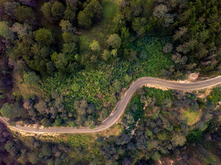Aerial view of a road crossing a forest in the department of Quiché.