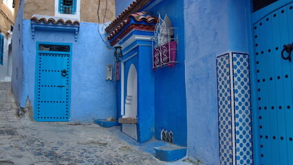 Tiled canopy over an arched entrance in the medina in Chefchaouen, Morocco