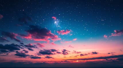 Fototapeta premium Stunning night sky with stars and colorful sunset clouds panorama