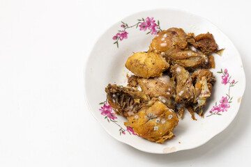 rotten fried chicken on a plate