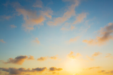 Obraz premium Orange clouds and morning sky,Real majestic sunrise sundown sky background with gentle colorful clouds without birds. Panoramic, big size,Sunset sky clouds in the evening summer with Orange, 