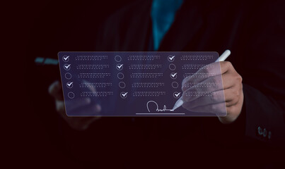 Digital contract and task approval concept. Businessman uses stylus to check off items on virtual...