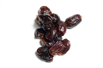 Moist Ajwa dates with a subtle sheen, possibly sugar-coated. A sweet, healthy snack perfect for Ramadan or a tasty treat