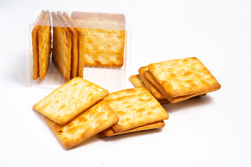 Cream crackers in a clear plastic container. A popular snack throughout Southeast Asia and even in parts of China.