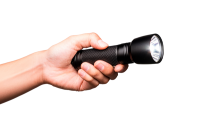 Hand holding lit black flashlight on black background, cut out transparent