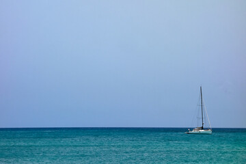 Fototapeta premium Sailboat on the sea off the coast of Costa Calma, Fuerteventura