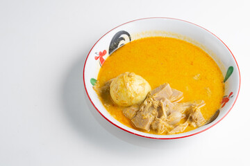 A bowl of Gulai Nangka, an Indonesian jackfruit curry with coconut milk and an egg. A flavorful and...