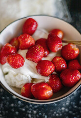 homemade farm strawberries with cottage cheese close-up