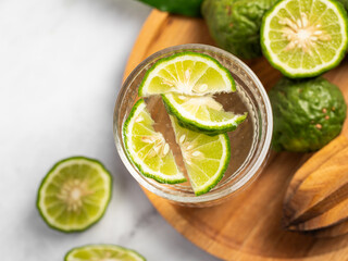 fresh water with lime, lemon, cold refreshing summer drink