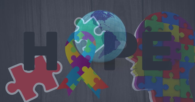 Image of colourful puzzle pieces, globe and hope text