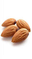 Four Brown Almonds on White Background Close Up Photography
