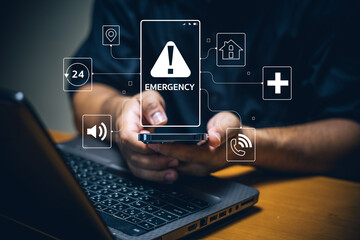 Emergency notification system digital communication mobile technology home office close-up safety...
