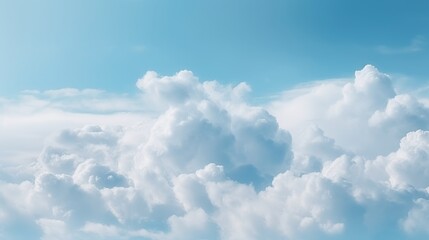 Fototapeta premium Blue sky with fluffy white clouds above.