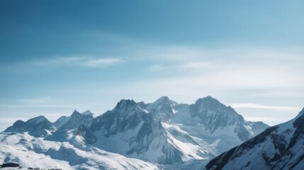 Breathtaking snowy mountain peaks under blue sky.
