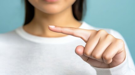 Woman pointing directly at viewer, captivating portrait of connection and focus