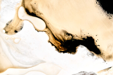 Abstract fluid dynamics of ink merging into creamy tones with rich brown gradients