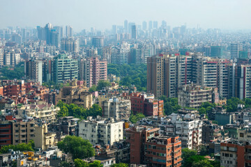 Panoramic view of a densely populated city with towering residential buildings and crowded