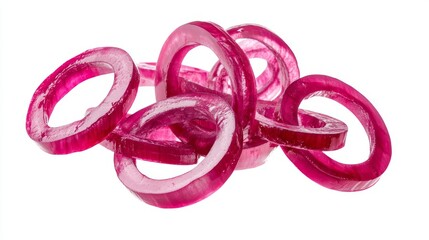 Naklejka premium photo of flying sliced red onion rings isolated on white background