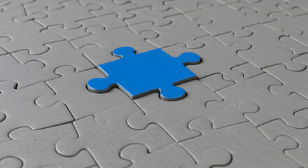 Blue Jigsaw Puzzle Piece on Gray Background Representing Solution and Completeness with Intricate Puzzle Pattern