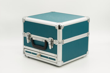 Closeup view of a sturdy tool case showcasing metal accents and textured surface details