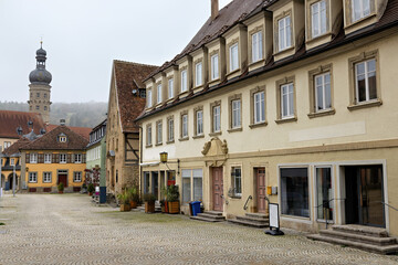 Naklejka premium City center with market square and church of Weikersheim in the Main-Tauber district in autumn