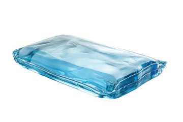 Fototapeta premium A translucent light blue rectangular pouch, sleek and modern, rests on a pristine white background, showcasing its smooth, glossy texture.