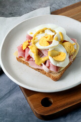 Ham, cheese, and hard-boiled egg sandwich