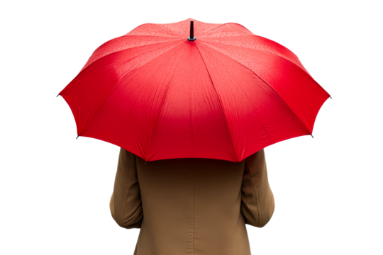 Bright red umbrella held against rain on a gloomy day