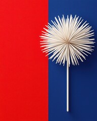 Minimalist art piece featuring a unique spiky object against bold background colors.