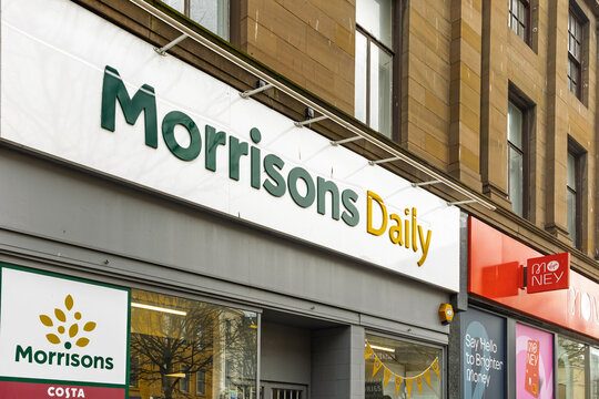 DUNDEE, UK - March 22, 2025: Morrisons Daily High Street Convenience Retail Store Next to Virgin Money in City Centre