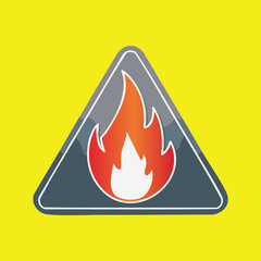 Fire hazard sign.  Triangle shape warning of flames on yellow background