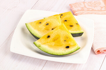Sweet and juicy yellow watermelon slices