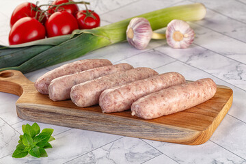 Raw pork sausages for grill