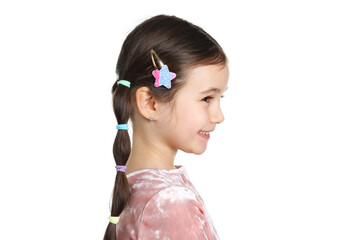 Little girl wearing beautiful hair accessories on white background
