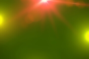 Colorful lens flares illuminating green background