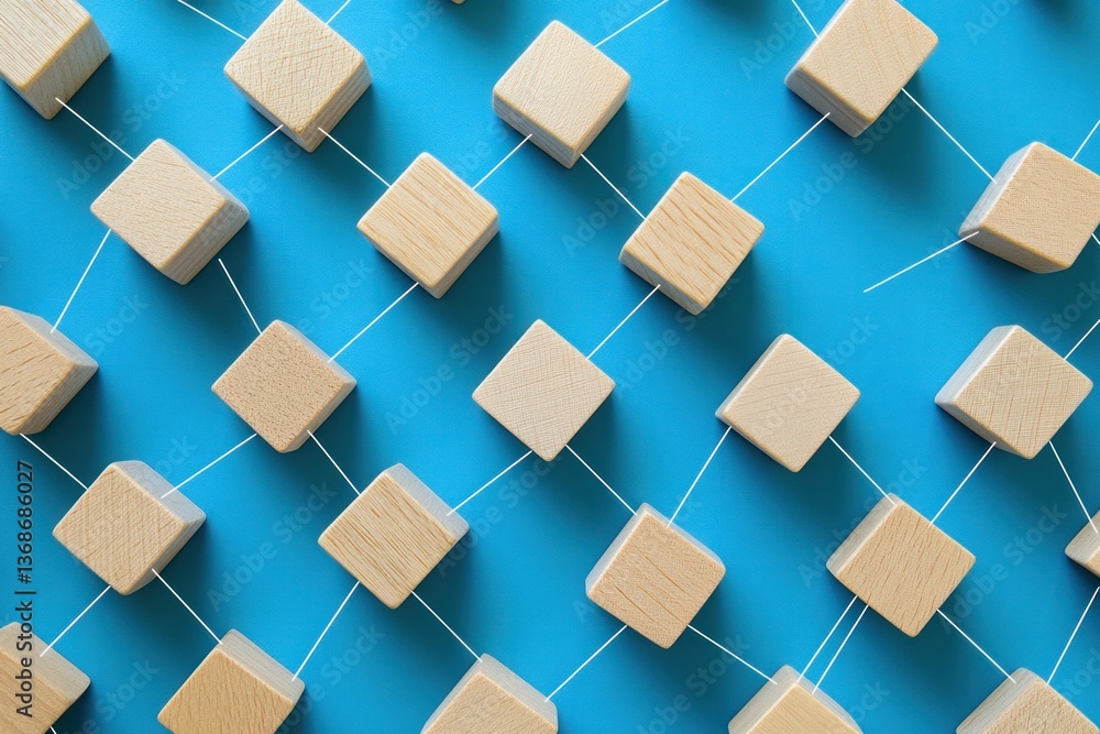 Poster a collection of small wooden blocks arranged in a pattern on a blue surface, with some blocks connec