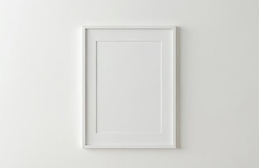 Empty white picture frame on wall. Minimalist white picture frame design. Blank canvas template to showcase image or artwork. Home interior decor mock-up.