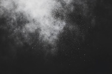 White powder explosion on black background.