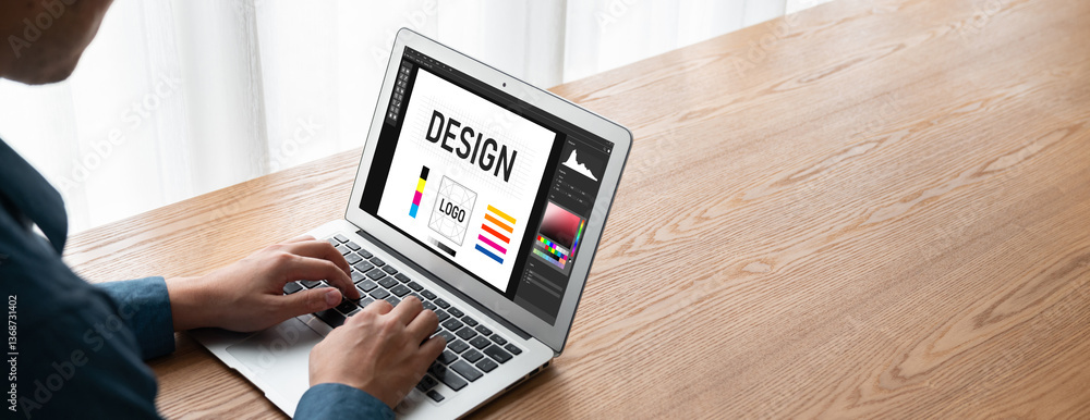 Poster graphic designer software for modern design of web page and commercial ads showing on the computer s
