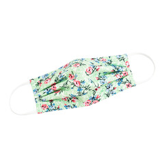 Stylish fabric face mask with pink and blue flowers on pastel green pleated for comfort ideal for a fashionable and safe everyday wear