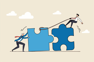 Jigsaw puzzle connection, teamwork partnership to help solve problem or challenge, cooperation or brainstorm to fit and match jigsaw pieces concept, businessman and woman help connect jigsaw puzzle.