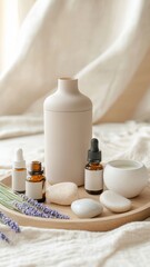 Fototapeta na wymiar Relaxing spa setup featuring essential oils, smooth stones, and lavender on a wooden tray in a serene indoor environment