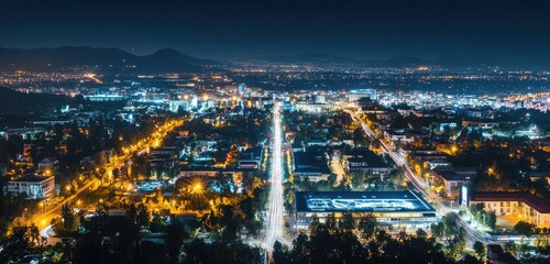 A wide shot of a smart city at night, with illuminated smart streets, connected homes, and automated public transport systems.