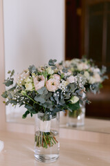 Pastel flower bouquet with mirror reflection.